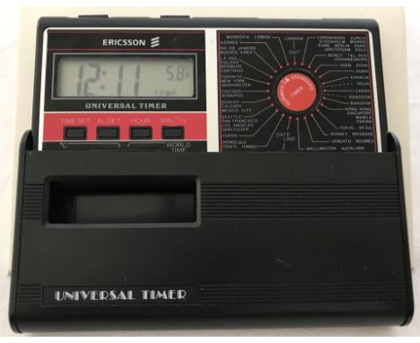 A 1970's Ericsson world time Universal Timer. Iconic executives desk clock with date line and summer standard timer, centigra