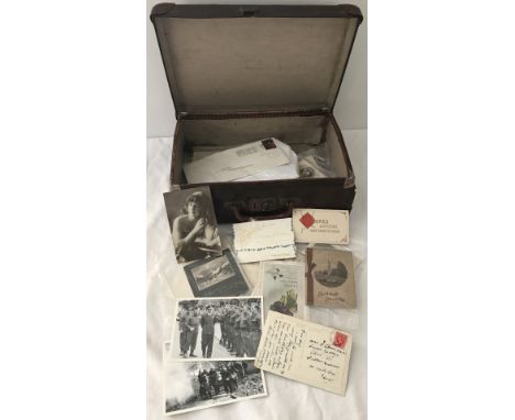 A small vintage Cheney brown leather suitcase with canvas lining To include contents, including postcards, greetings cards an