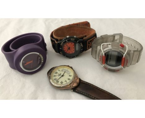 2 digital watches together with 2 quartz watches. Purple "slap" watch, XT-1 Sport digital chronograph watch on clear plastic 