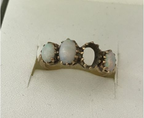 Vintage 9ct gold ring set with oval opals. One opal missing. Total weight approx 2.6g