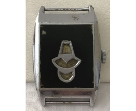 An early 1930's digital disc chrome oblong cased watch head. With triple window, black front face. Case No 604581. 