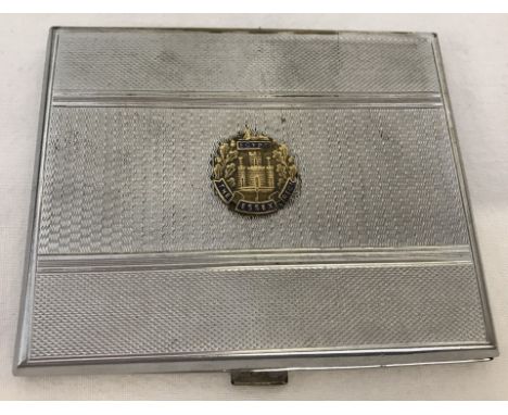 A vintage chrome cigarette case with The Essex Regiment Insignia featuring Egypt battle honour. Insignia has blue enamelled d