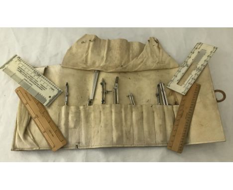 A WW2 soft cased draughtsman's set of drawing instruments. Soft leather case dated 1943 with arrow War Dept arrow mark. Instr