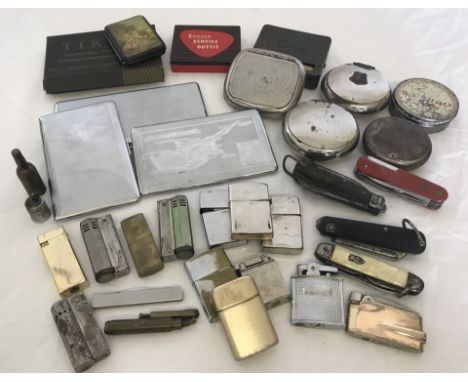 A quantity of vintage lighters and penknives. To include Ronson. 
