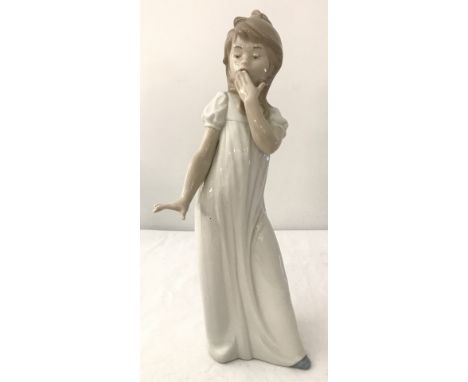 A Nao figure  " Girl Yawning " # 2000230.  Unboxed.  Approx height 29cm.