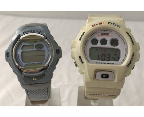 2 vintage G-Shock watches on original straps. A white Bape, Bathing Ape, digital chronograph wrist watch, in working order, N
