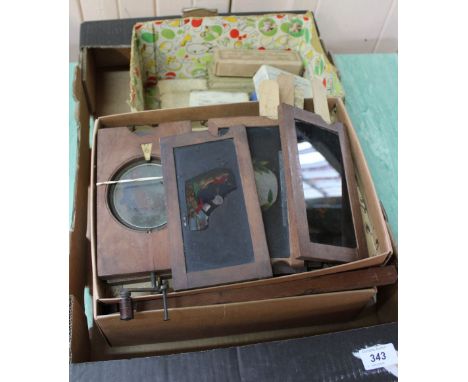 A fine collection of coloured magic lantern slides comprising of two mechanical moving ship wheel and rat on bed, six hand sl