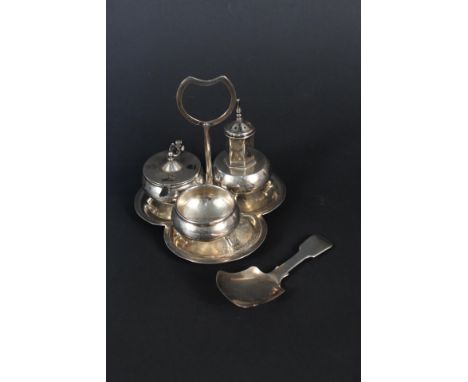 A Victorian silver caddy spoon and a white metal cruet on stand with niello decoration, each piece has an engraved monogram