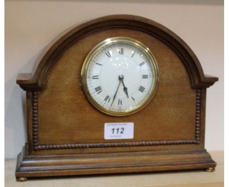 An Edwardian mahogany mantel clock
