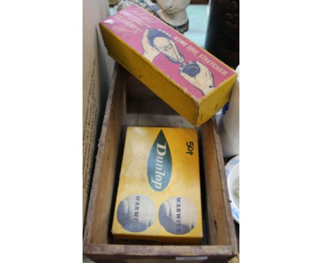 A Wood Thorleys Gravel for Horses box containing boxed 'Foot Aid' home shoe stretcher and Dunlop tennis balls