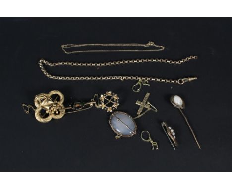 A quantity of yellow metal jewellery including brooches, stick pin, chains etc