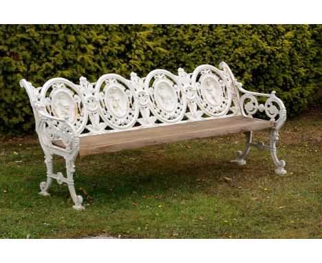 Garden Seat: A rare Macauley and Wade foundry Seasons pattern cast iron seatlast quarter 19th centurywith later replaced wood