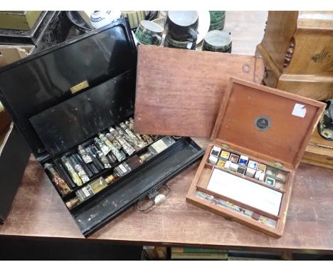 A VINTAGE 'REEVES &amp; SONS' BLACK JAPPANED ARTIST'S BOX and a similar wooden paint box