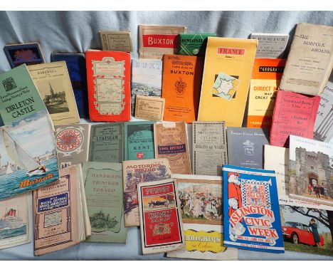 A COLLECTION OF VINTAGE TRAVEL MAPS guides, and souvenir albums, mostly early to mid 20th century