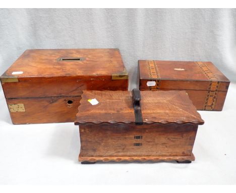 A COTSWOLD SCHOOL STYLE ARTS AND CRAFTS TEA CADDY dated 1936, and two Victorian boxes