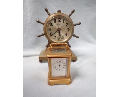 A MINIATURE FRENCH CARRIAGE CLOCK and a ship's wheel clock