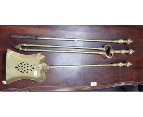 A SET OF THREE VICTORIAN BRASS FIRE TOOLS 