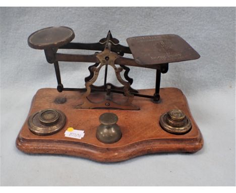A SET OF POSTAL SCALES 