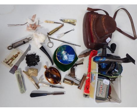 A VICTORIAN CLAY PIPE IN THE FORM OF A WOMAN'S HEAD a compact, camera, fishing reel with hooks and sindries