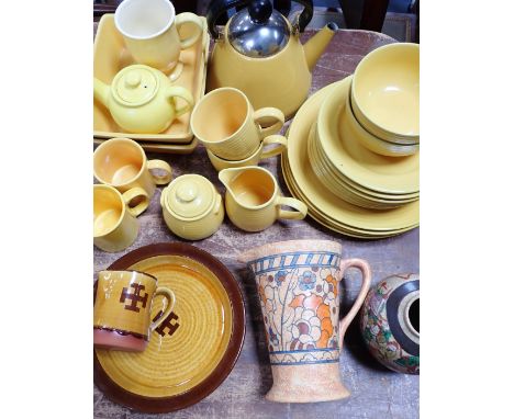 A CHARLOTTE RHEAD JUG 20 cm high 9chips to foot) an oriental ginger jar, an enamel kettle, and a quantity of ceramics
