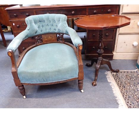 AN EDWARDIAN ROSEWOOD FRAMED TUB CHAIR with marquetry decoration and buttoned back, and a Chippendale revival tripod table (t