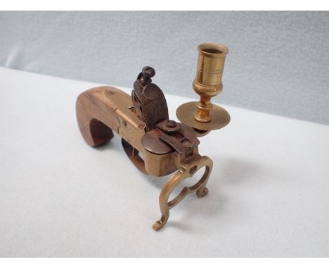 A PISTOL TINDER LIGHTER reproduction, made in Italy