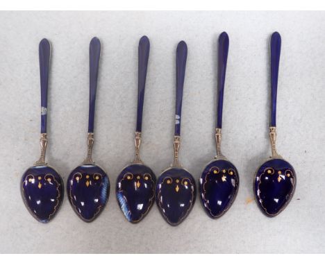 A SET OF SIX SILVER AND BLUE ENAMEL SPOONS 