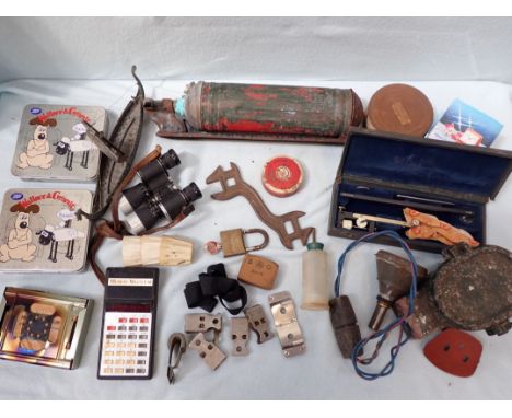 A VINTAGE FIRE EXTINGUISHER with wall mount, and sundries