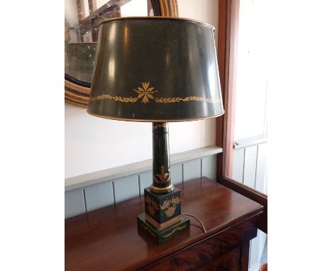 A 'TOLEWARE' LAMP AND SHADE with gilt decoration 60 cm high (moulding missing from base, chips, shadeholder needs repair)