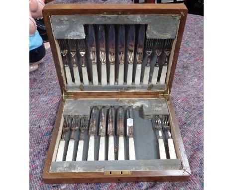 A CASED SET OF MOTHER OF PEARL HANDLED DESSERT SET silver plate, one knife and one fork missing