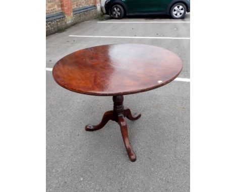 A GEORGE III MAHOGANY TRIPOD TABLE with later lower supports and heavily sanded and over polished top, 91cm dia