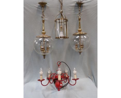 A PAIR OF REPRODUCTION HALL LANTERNS with globe shades (one finial missing)  approx. 60 cm long, a cylindrical hall lantern, 