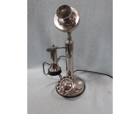 A REPRODUCTION 'CANDLESTICK' TYPE TELEPHONE chrome plated
