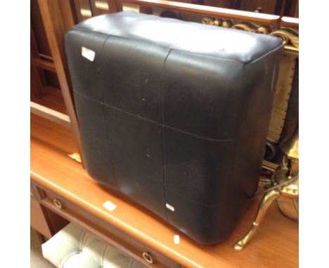 A BLACK REXENE POUFFE
