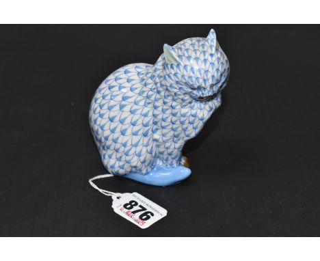 A HEREND BLUE FISHNET FIGURE OF A SEATED CAT, model no. 5853, gilt detail to muzzle and paws, light green ears, printed and i