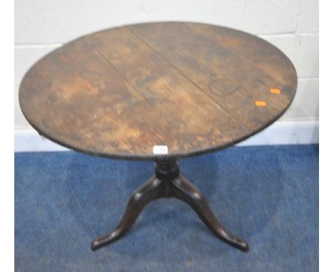 A GEORGIAN OAK CIRCULAR TILT TOP TRIPOD TABLE, diameter 87cm x height 72cm, condition report: historical mark, scuffs, stains