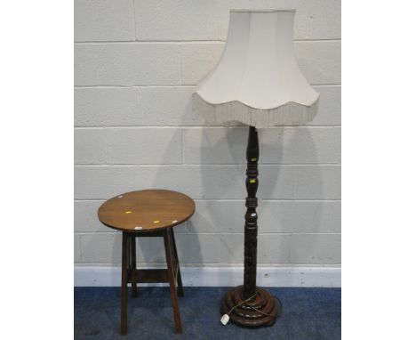AN ARTS AND CRAFTS OAK CIRCULAR OCCASIONAL TABLE, with parquetry inlay to the edge and sides, raised on splayed legs, united 