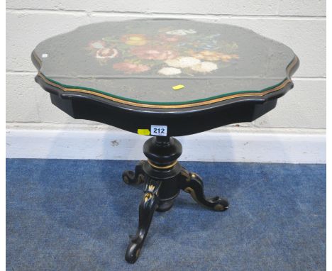 AN EBONISED TRIPOD TABLE, with painted foliate decoration, diameter 70cm x height 61cm, condition report: general signs of us