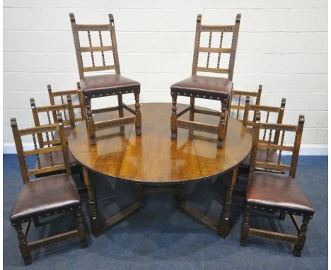NIGEL GRIFFITHS, A REPRODUCTION SOLID OAK GATE LEG TABLE, raised on block and turned legs, diameter 161cm x closed width 59cm