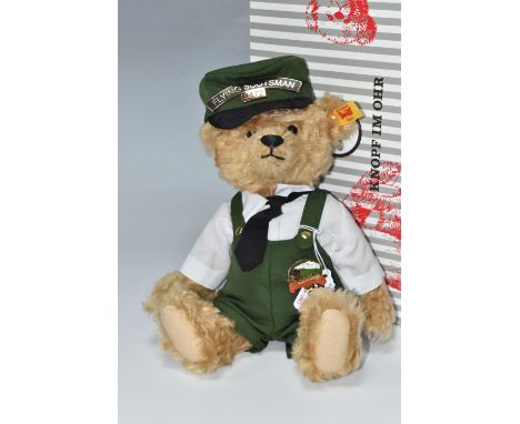 A BOXED STEIFF ALWAYS BILL 'FLYING SCOTSMAN' TEDDY BEAR, no 664694, in golden mohair, wearing a train driver's outfit with Fl