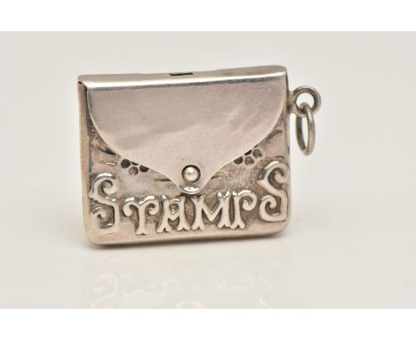 A WHITE METAL STAMP HOLDER, in the form of an envelope, inscribed 'Stamps', fitted with a jump ring for suspension, stamped '