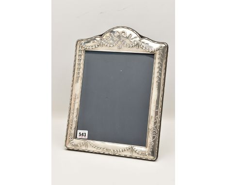 A LARGE SILVER PHOTO FRAME, decorated with a bow and swag pattern, blue suede backing with easel, hallmarked 'Carr's of Sheff