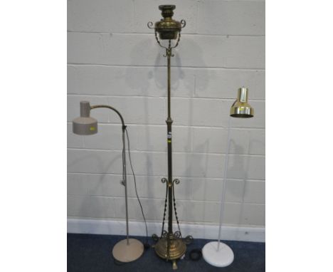 VERITAS LAMP WORKS, A 20TH CENTURY GERMAN BRASS TELESCOPIC OIL LAMP, with spiral supports, raised on three feet, maximum heig