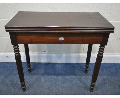 A MAHOGANY FOLD OVER CARD TABLE, the two back legs pull out revealing a storage section, and a table top rest, width 82cm x d