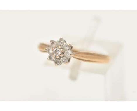 A 9CT GOLD DIAMOND CLUSTER RING, small circular cluster of nine small round brilliant cut diamonds, each in a claw setting, p