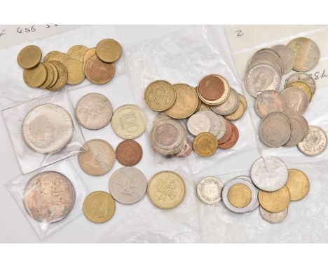A PLASTIC POT OF MIXED COINS TO INCLUDE A SILVER HINDU GOOD LUCK TOKEN etc