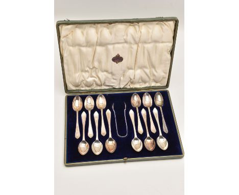 A CASED SET OF EARLY 20TH CENTURY SILVER TEASPOONS AND SUGAR TONGS, to include twelve teaspoons with a bright cut pattern, to
