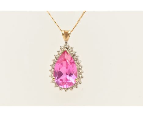 A 9CT GOLD GEM SET PENDANT WITH CHAIN, the pendant of a pear drop shape with a central pear cut pink sapphire (assessed as sy