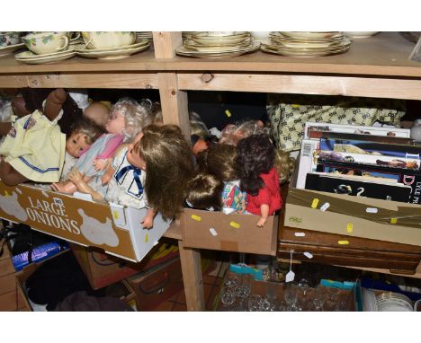 FOUR BOXES AND ONE SUITCASE OF DOLLS, BOOKS AND SEWING MACHINE to include a collection of 'Tiny Tears' dolls, vintage teddy b