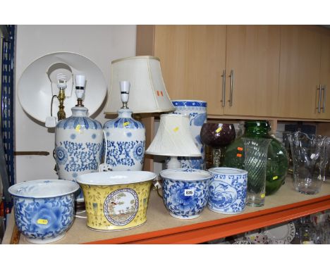 A COLLECTION OF LARGE CERAMIC AND GLASS ITEMS to include three blue and white planters with floral designs, a yellow planter 